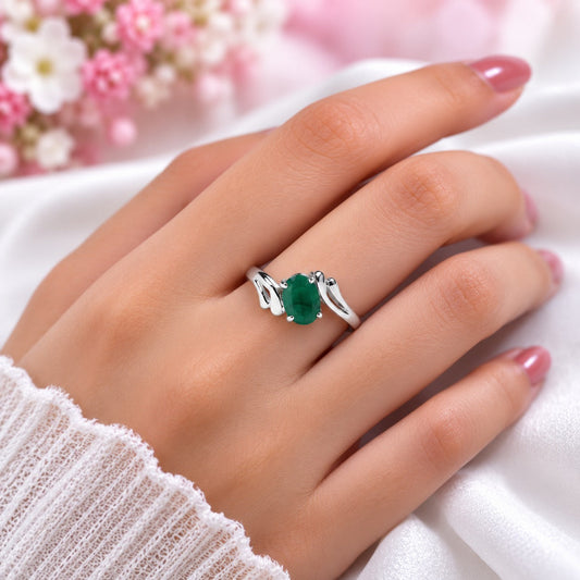 Curved Band Emerald Ring crafted in 925 Sterling Silver with a green oval cut Emerald gemstone.