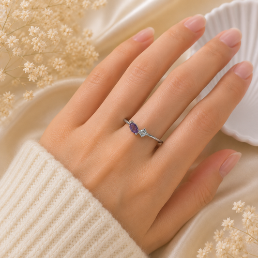 Twin Amethyst Ring in 925 Sterling Silver with a marquise purple gemstone and round white accent stone