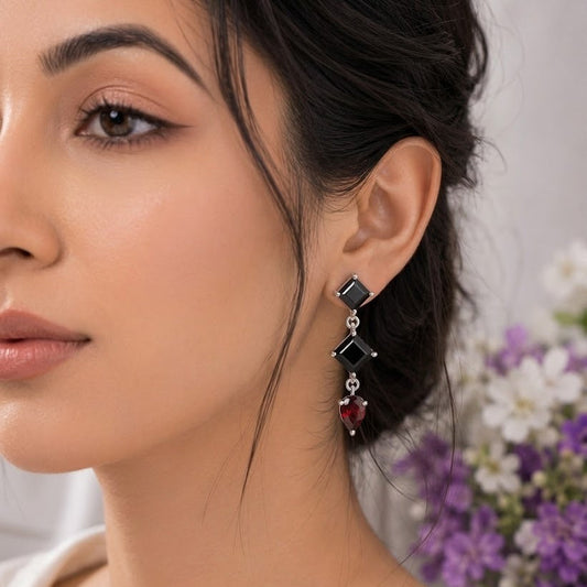 Black Onyx & Labradorite Drop Earrings in 925 Sterling Silver featuring square-cut Black Onyx and pear-cut Labradorite gemstones.