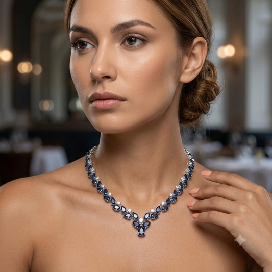 London Blue Topaz Floral Necklace in 925 Sterling Silver featuring pear-cut London Blue Topaz gemstones accented with White Topaz.