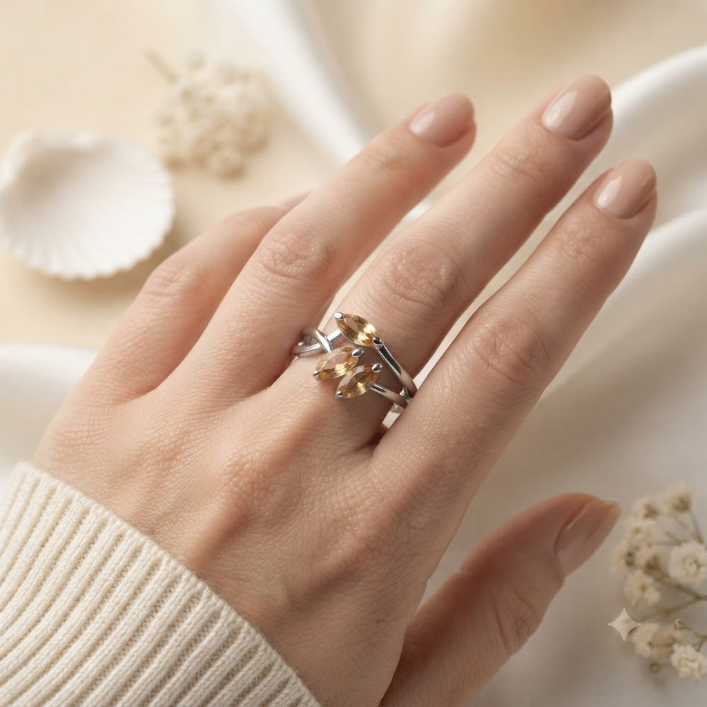 Triple Citrine Floral Ring crafted in 925 Sterling Silver with three yellow Citrine gemstones.