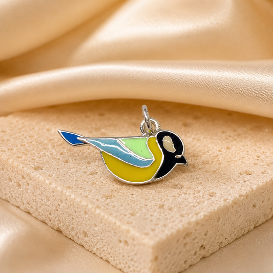 Vibrant blue tit bird enamel charm in silver-tone metal