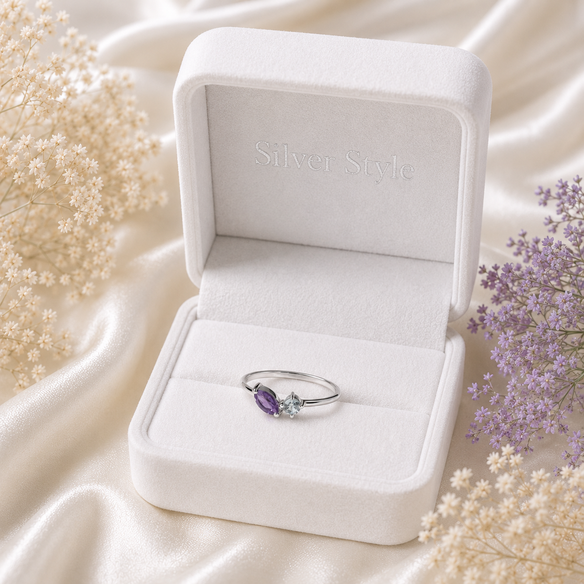 Twin Amethyst Ring in 925 Sterling Silver with a marquise purple gemstone and round white accent stone