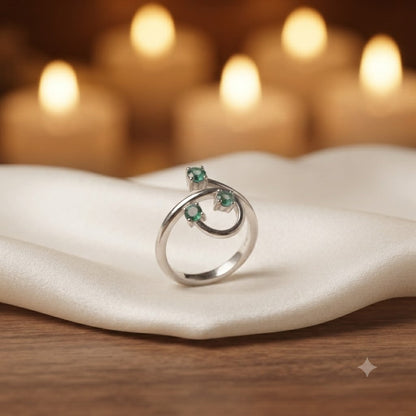 Triple Emerald Spiral Ring crafted in 925 Sterling Silver with three green Emerald gemstones