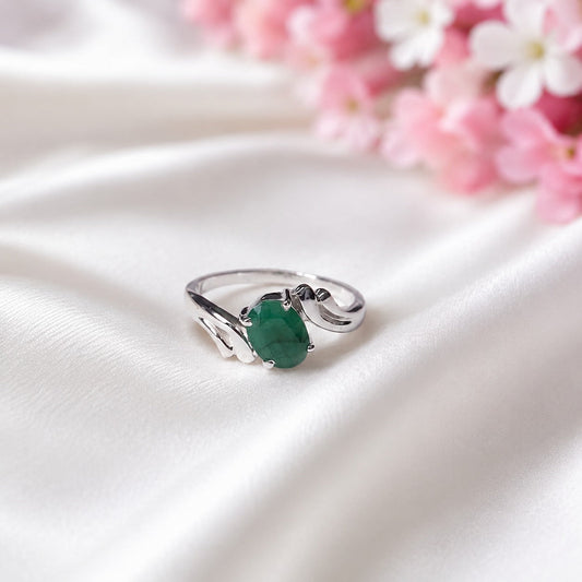 Curved Band Emerald Ring crafted in 925 Sterling Silver with a green oval cut Emerald gemstone.