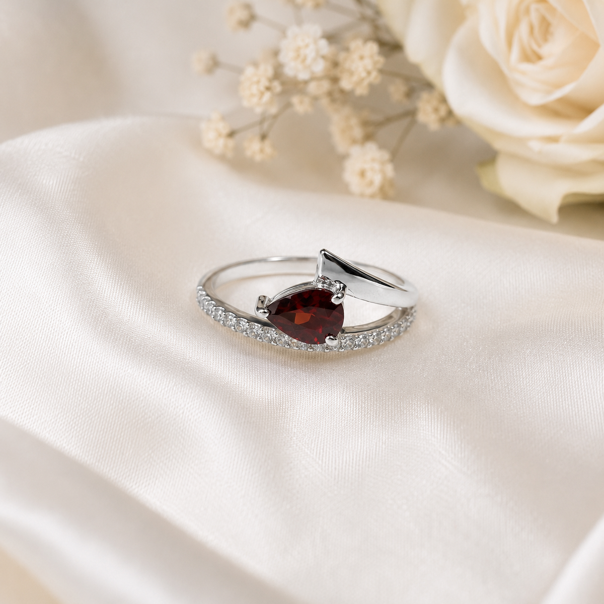 Pear Garnet Bypass Ring in 925 Sterling Silver