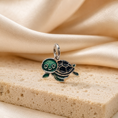 Charming sea turtle enamel charm in green and silver