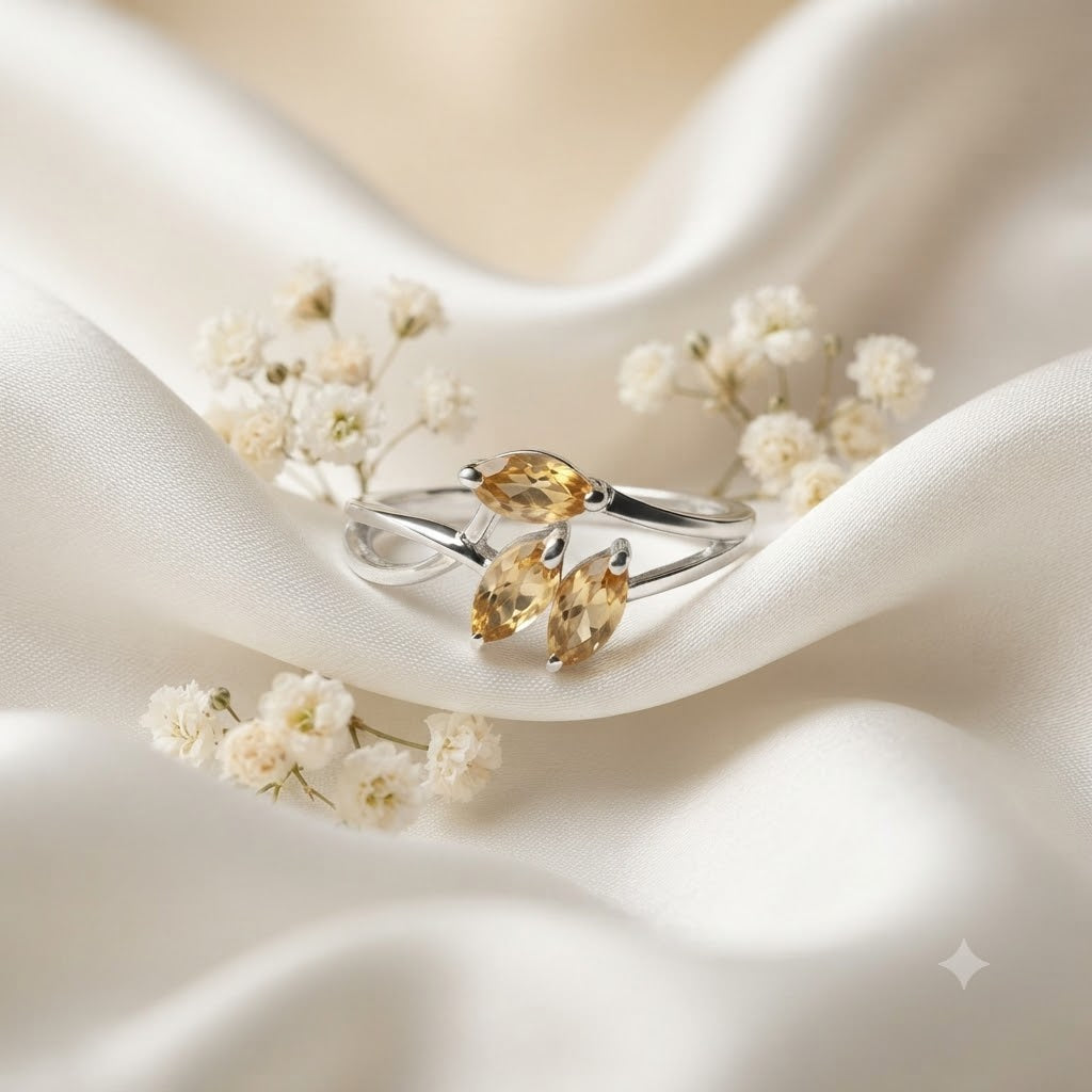 Triple Citrine Floral Ring crafted in 925 Sterling Silver with three yellow Citrine gemstones.
