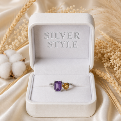 Twin Amethyst Ring in 925 Sterling Silver featuring an emerald cut purple Amethyst and a heart-shaped golden Citrine