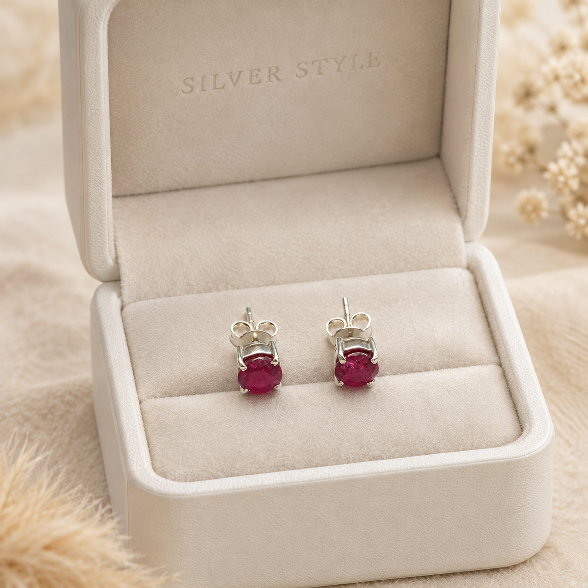 Ruby stud earrings in 925 sterling silver with red gemstone