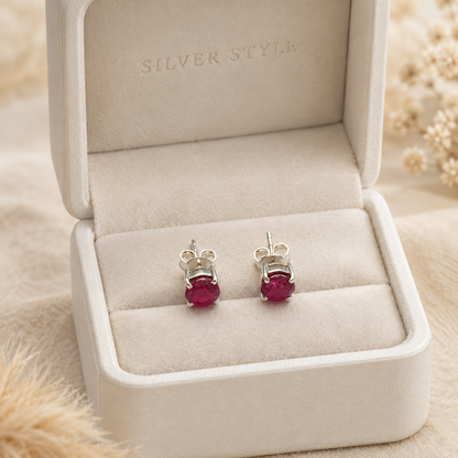 Ruby stud earrings in 925 sterling silver with red gemstone