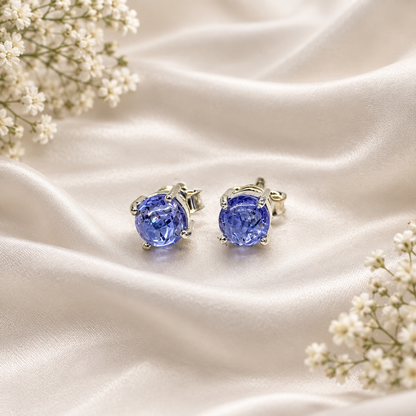 Round Tanzanite stud earrings in 925 sterling silver by Silver Style