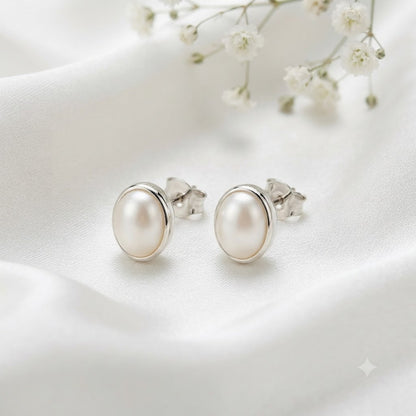 Pearl oval stud earrings in 925 sterling silver