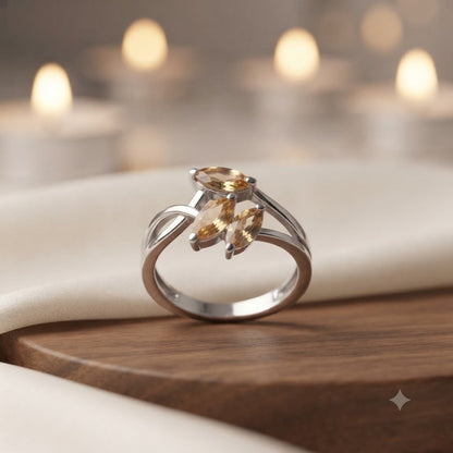 Triple Citrine Floral Ring crafted in 925 Sterling Silver with three yellow Citrine gemstones.