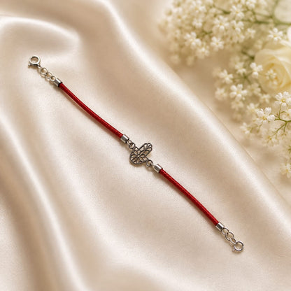 Floral Hamsa charm bracelet on red cord in 925 Silver