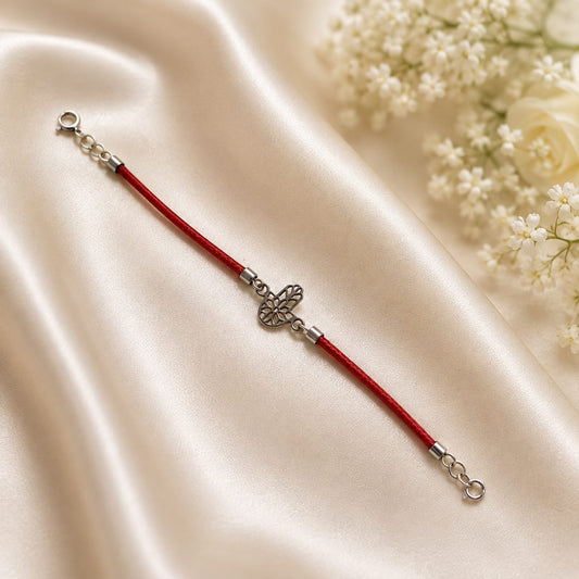 Floral Hamsa charm bracelet on red cord in 925 Silver