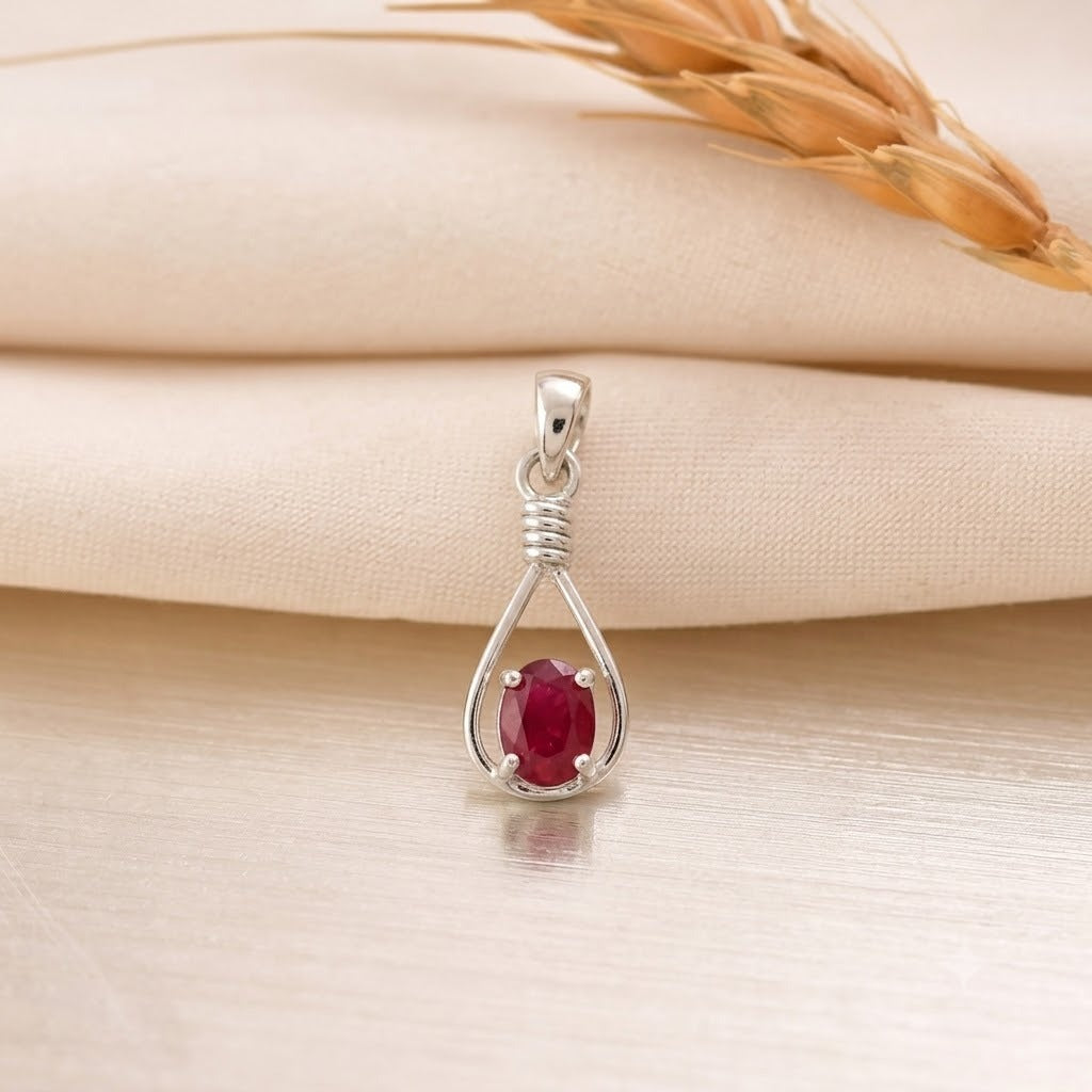 Ruby Drop Pendant in 925 Sterling Silver with oval-cut red gemstone.