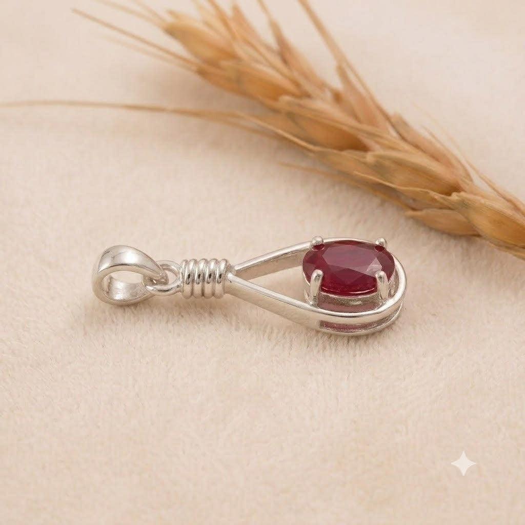 Ruby Drop Pendant in 925 Sterling Silver with oval-cut red gemstone.