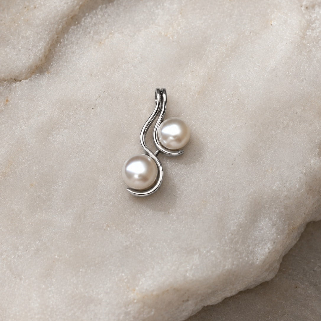 Pearl Drop Pendant in 925 Sterling Silver with lustrous white pearls.