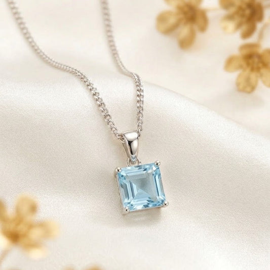 Sky Blue Topaz Pendant in 925 Sterling Silver with square-cut blue gemstone.