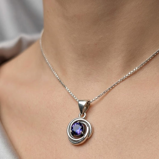 Amethyst Circle Pendant in 925 Sterling Silver with round-cut purple gemstone.