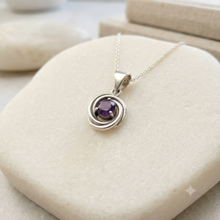 Amethyst Circle Pendant in 925 Sterling Silver with round-cut purple gemstone.