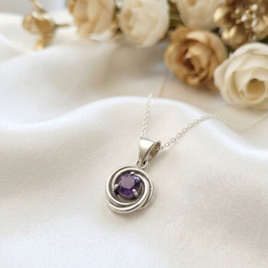 Amethyst Circle Pendant in 925 Sterling Silver with round-cut purple gemstone.