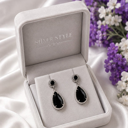 Black Onyx Drop Earrings in 925 Sterling Silver with pear-cut black gemstones.