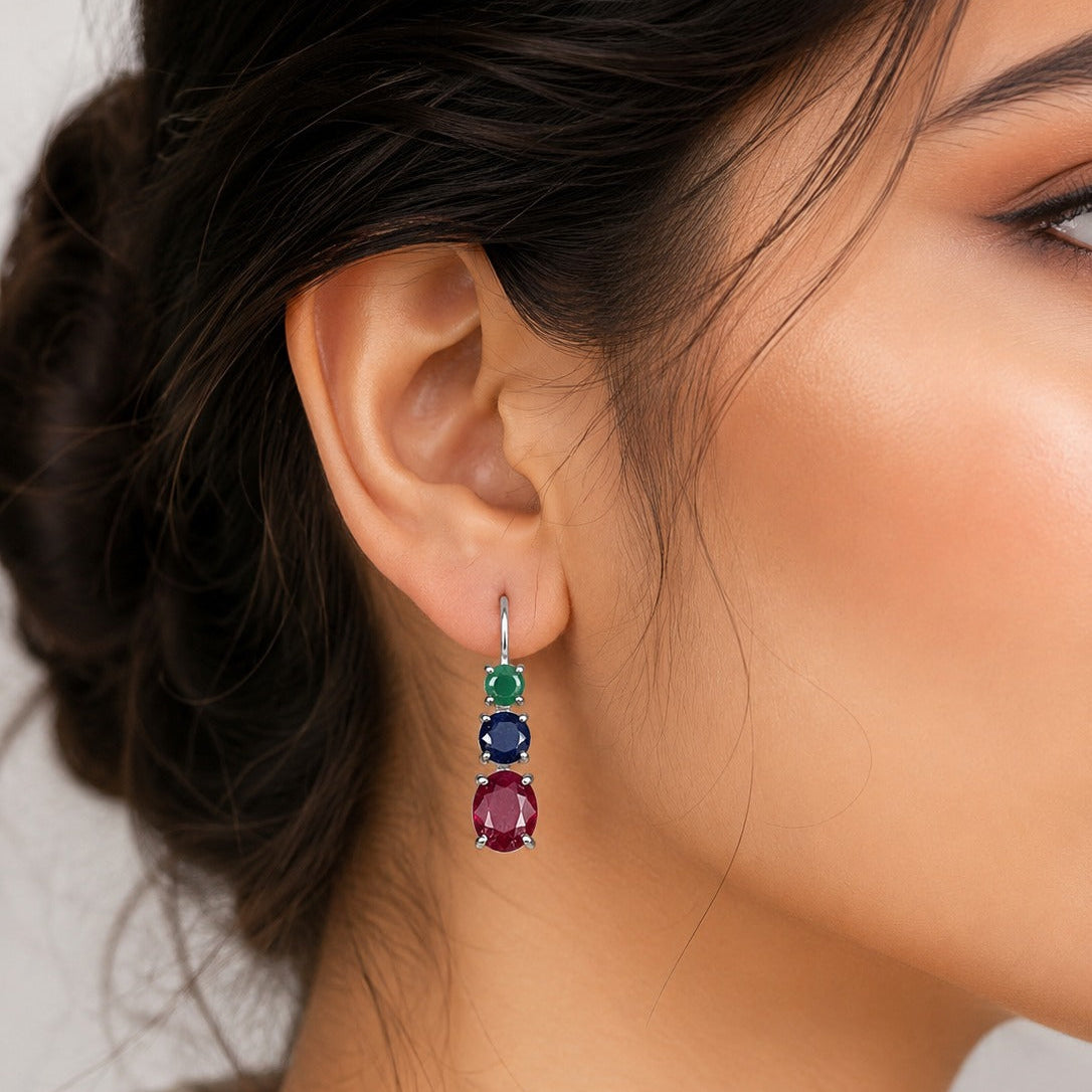925 Sterling Silver Drop Earrings featuring Emerald, Blue Sapphire, and Ruby gemstones in a vertical three-stone design.