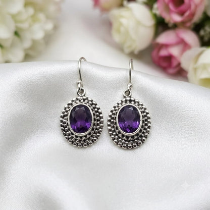 925 Sterling Silver Vintage Drop Earrings featuring oval-cut natural Amethyst gemstones with an intricate oxidized silver frame.