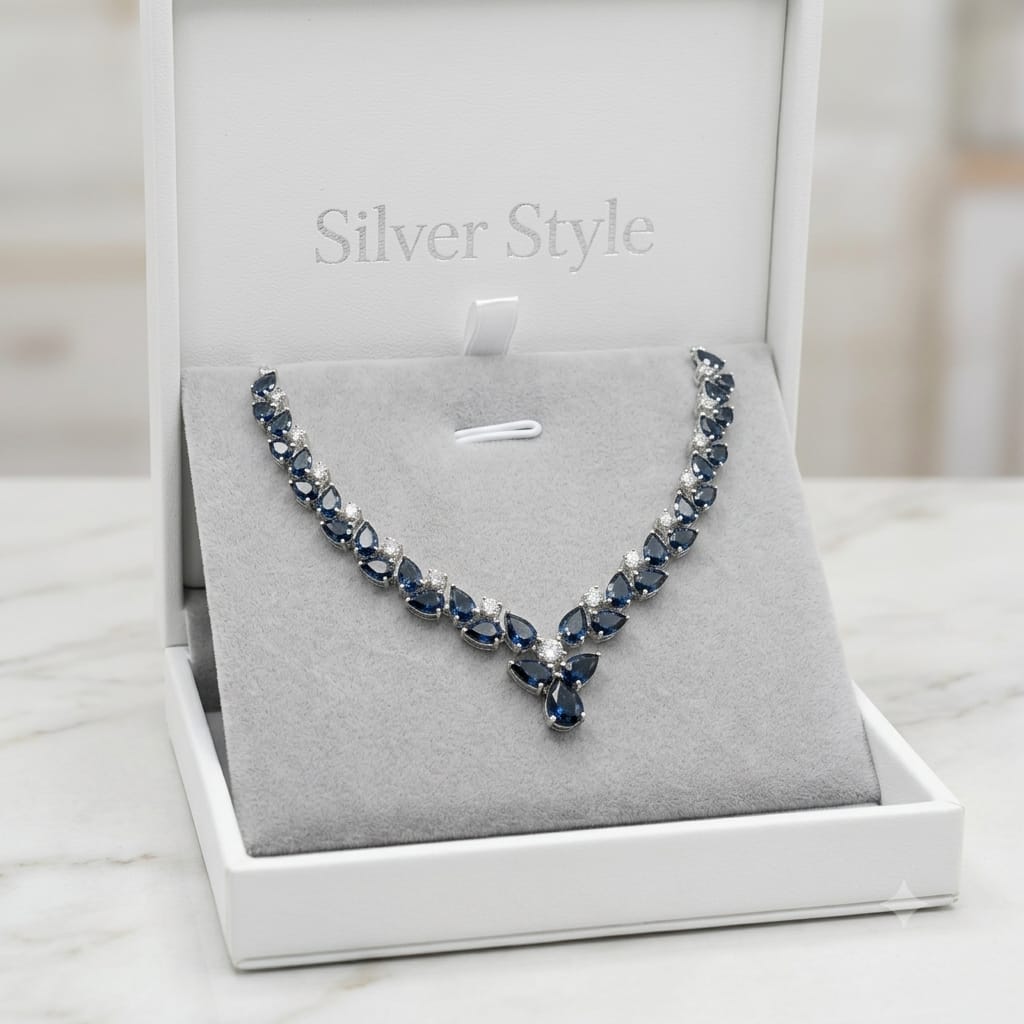 London Blue Topaz Floral Necklace in 925 Sterling Silver featuring pear-cut London Blue Topaz gemstones accented with White Topaz.