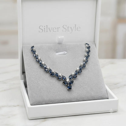 London Blue Topaz Floral Necklace in 925 Sterling Silver featuring pear-cut London Blue Topaz gemstones accented with White Topaz.
