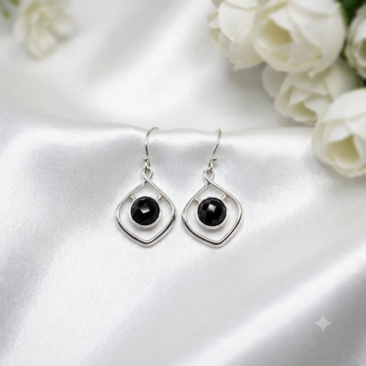 Black Onyx Geometric Earrings in 925 Sterling Silver with faceted round Black Onyx gemstones.