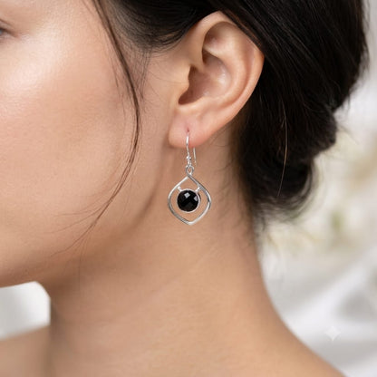 Black Onyx Geometric Earrings in 925 Sterling Silver with faceted round Black Onyx gemstones.