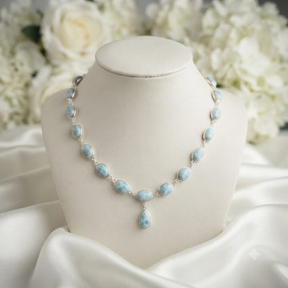 Larimar Oval Drop Necklace in 925 Sterling Silver featuring polished oval Larimar gemstones with a delicate teardrop pendant.