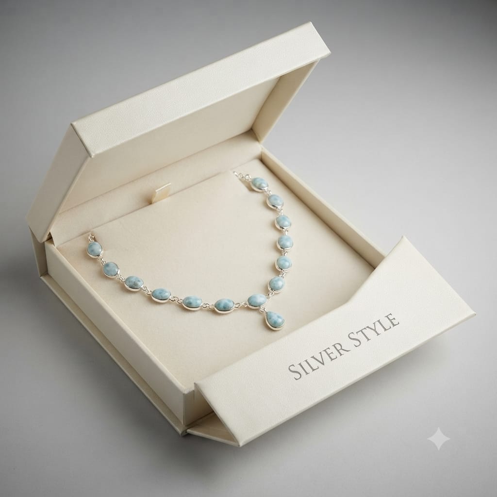 Larimar Oval Drop Necklace in 925 Sterling Silver featuring polished oval Larimar gemstones with a delicate teardrop pendant.