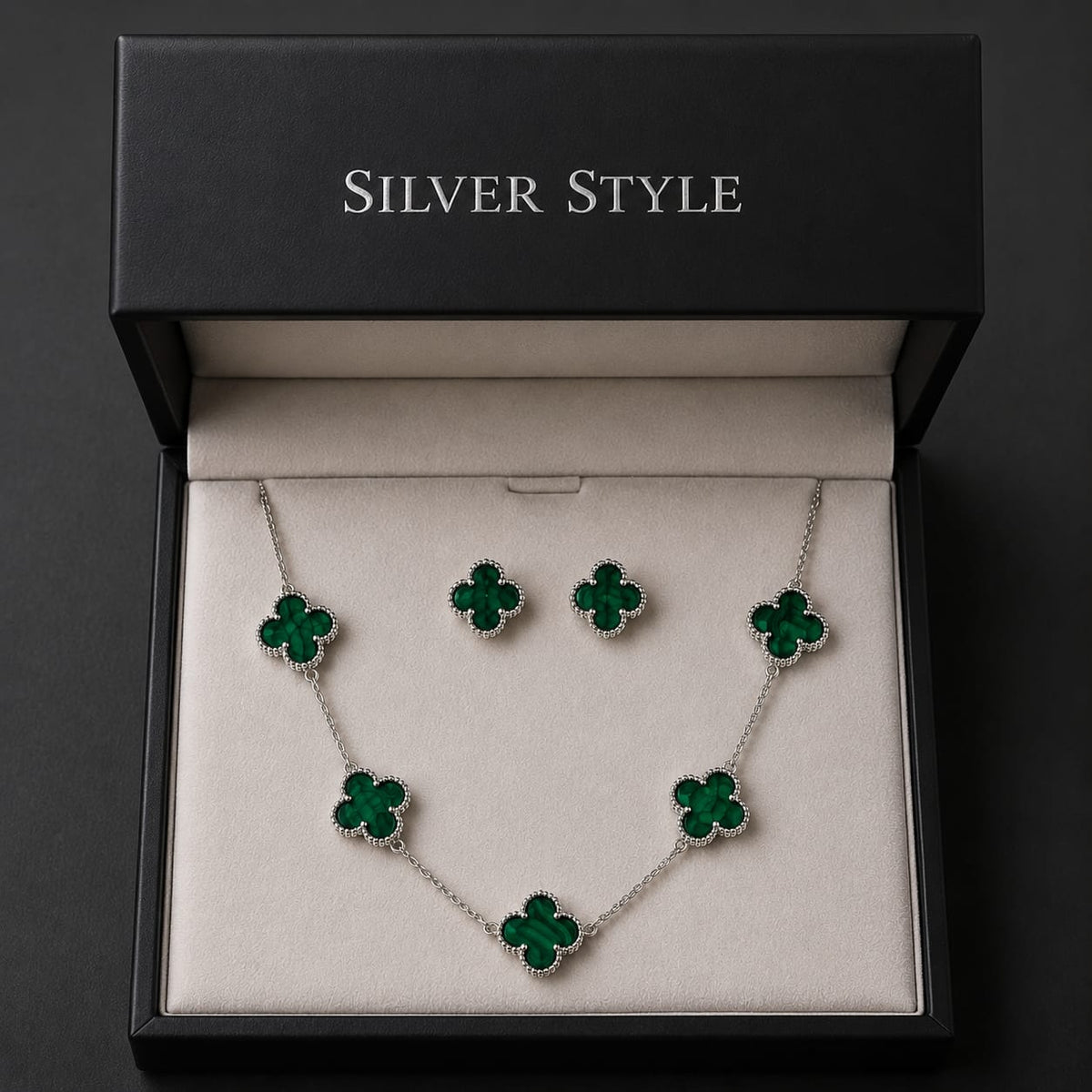 Green Malachite Clover Jewelry Set in 925 Sterling Silver featuring a matching clover necklace and stud earrings.