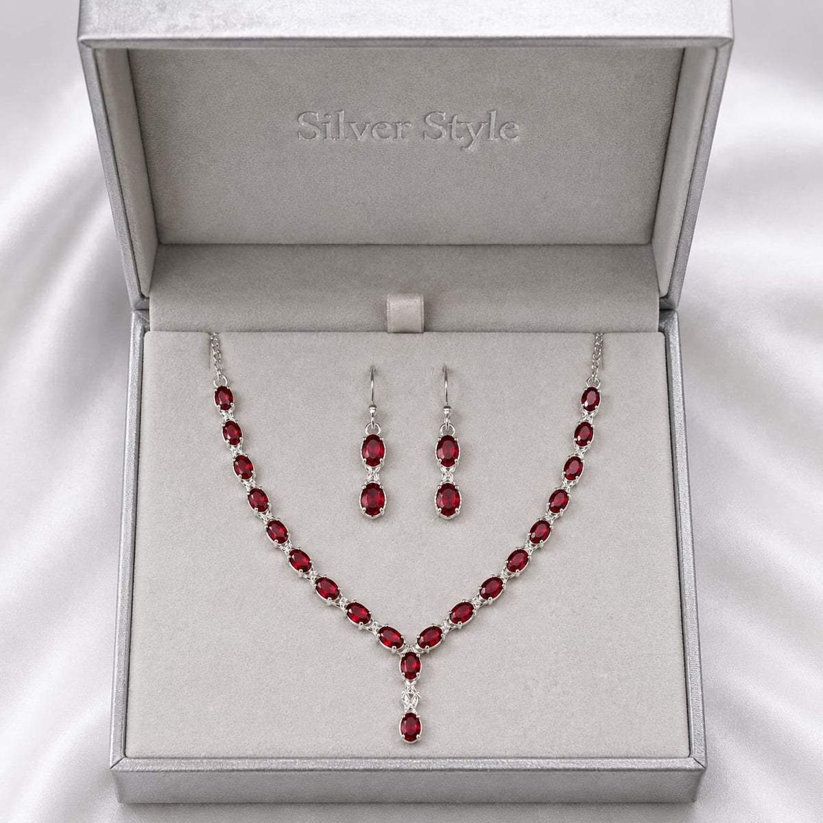 Red Ruby Classic Necklace and Earrings Set in 925 Sterling Silver featuring oval-cut Red Ruby gemstones with matching earrings.