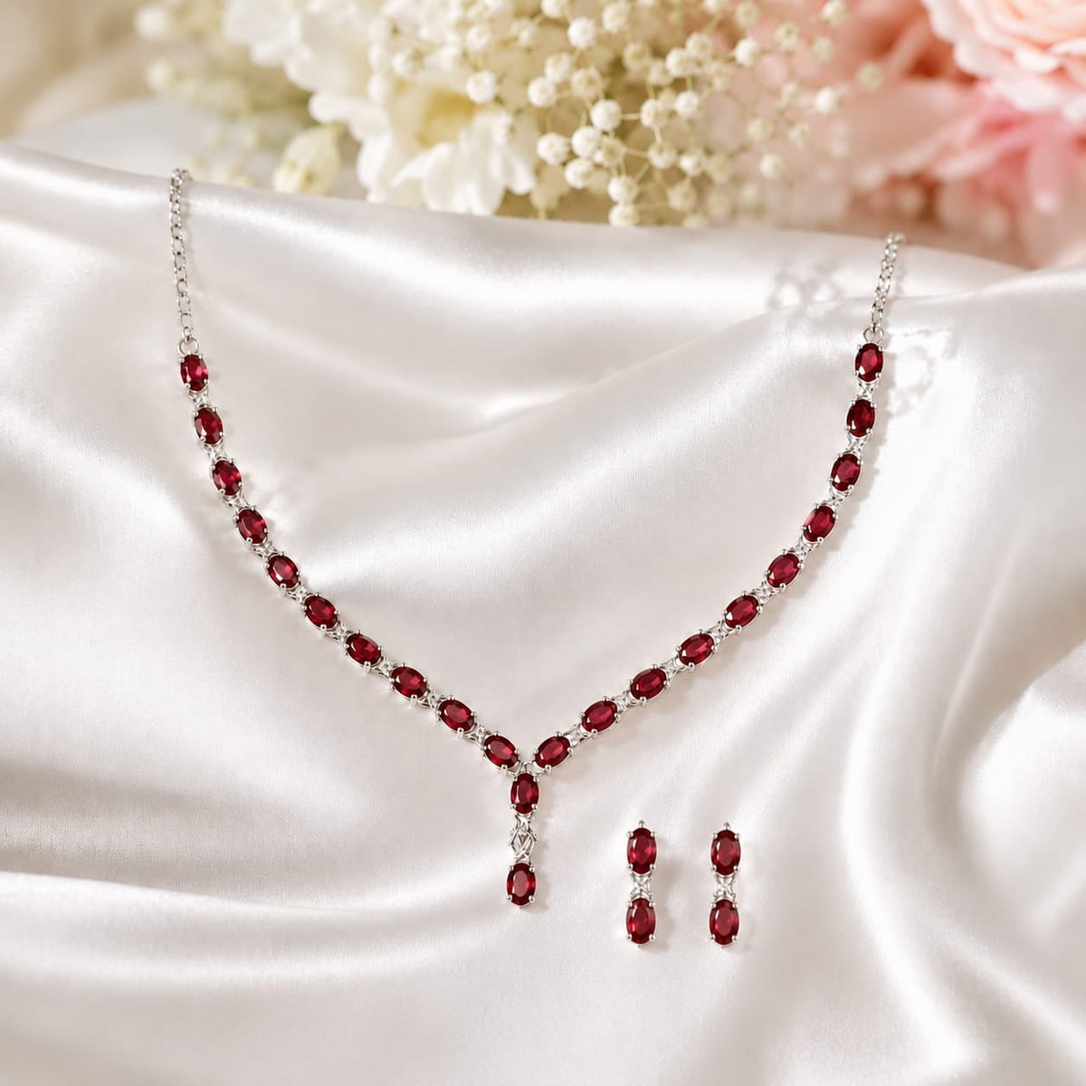 Red Ruby Classic Necklace and Earrings Set in 925 Sterling Silver featuring oval-cut Red Ruby gemstones with matching earrings.