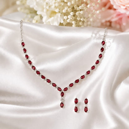Red Ruby Classic Necklace and Earrings Set in 925 Sterling Silver featuring oval-cut Red Ruby gemstones with matching earrings.
