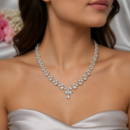 White Topaz Floral Statement Necklace in 925 Sterling Silver featuring pear-cut and round White Topaz gemstones arranged in a floral vine design.