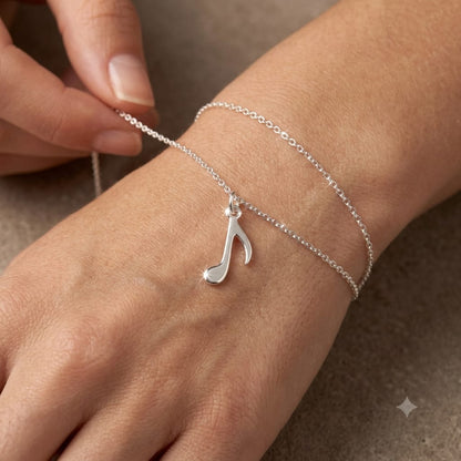 925 Sterling Silver Musical Note Charm Pendant on White Satin Background