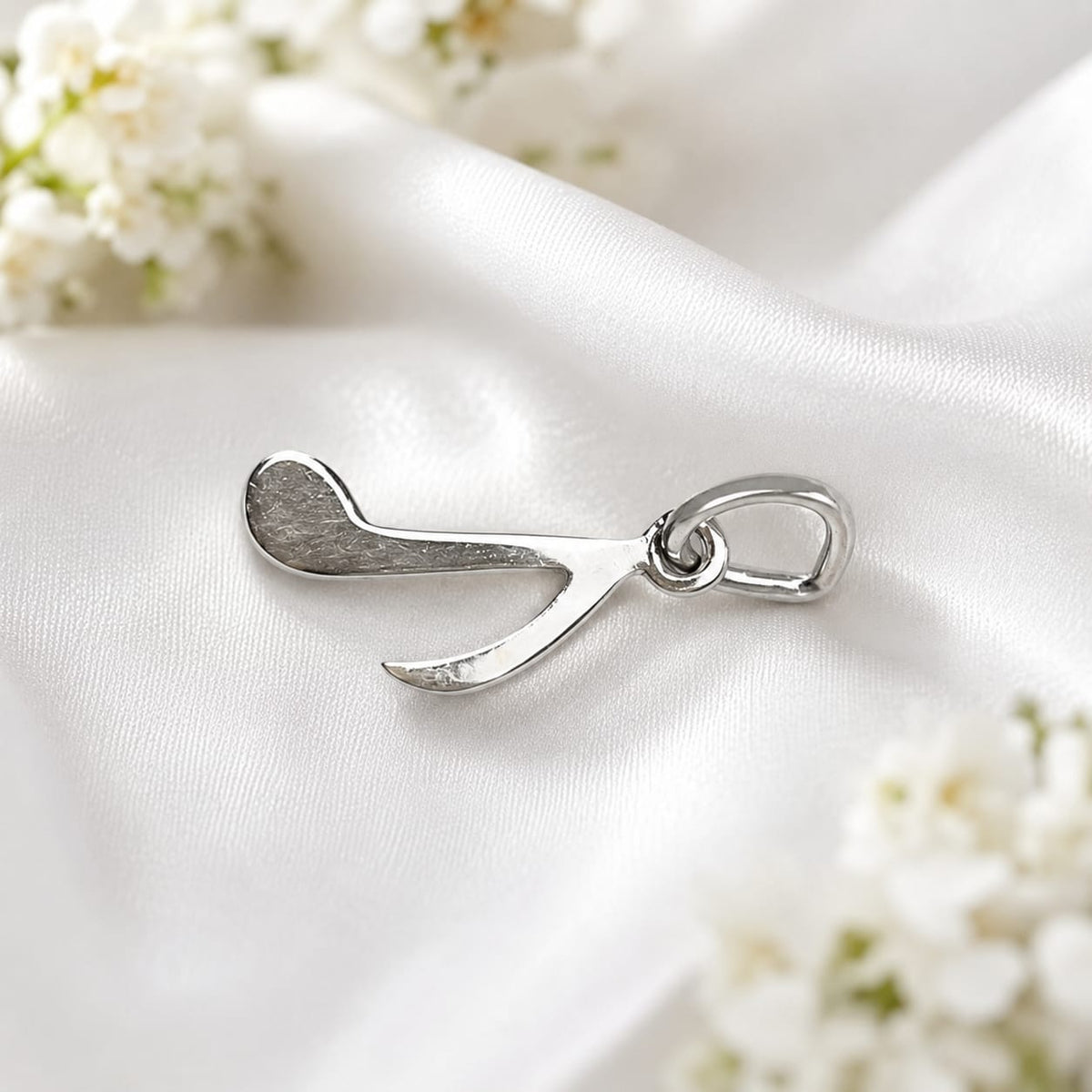 925 Sterling Silver Musical Note Charm Pendant on White Satin Background
