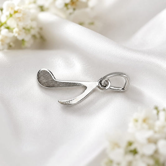 925 Sterling Silver Musical Note Charm Pendant on White Satin Background