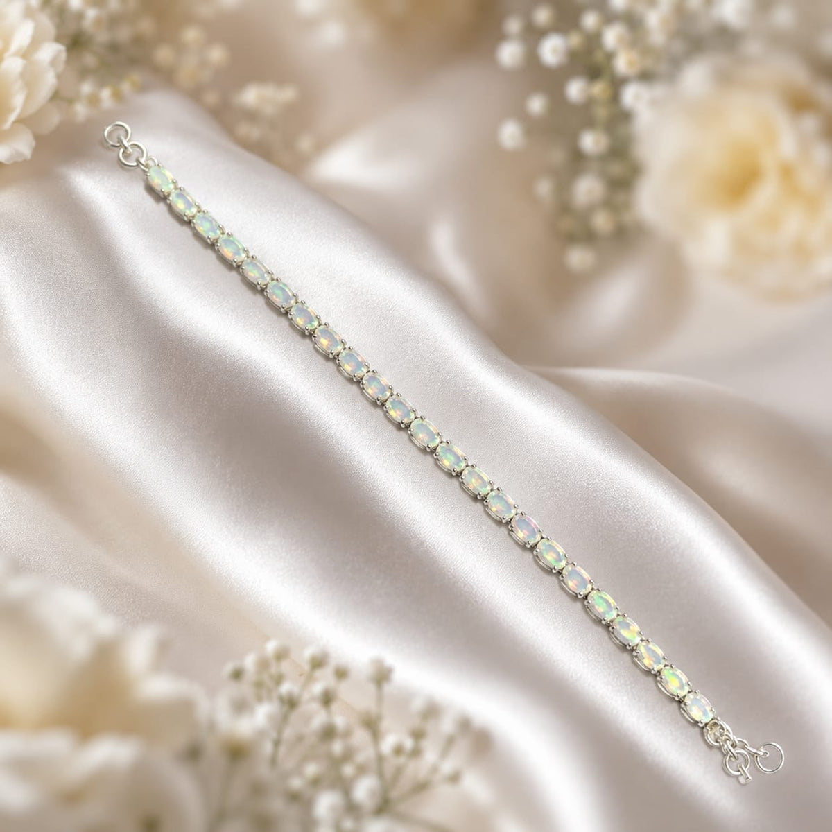 White Opal Tennis Bracelet in 925 Sterling Silver worn on wrist