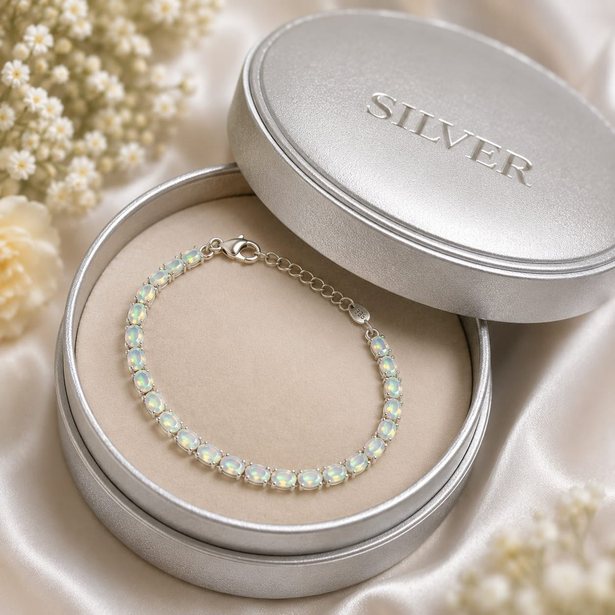 White Opal Tennis Bracelet in 925 Sterling Silver worn on wrist