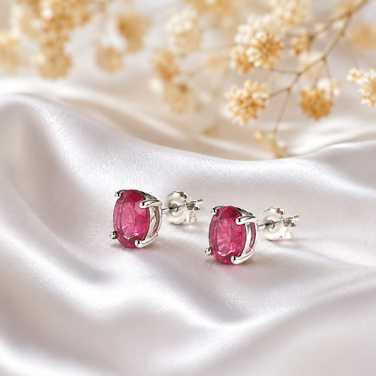 Oval pink Pink Tourmaline ear studs in 925 Sterling Silver with four-prong setting