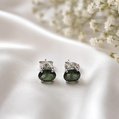 Oval green Green Tourmaline ear studs in 925 Sterling Silver with four-prong setting