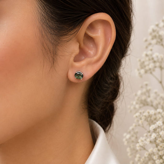 Oval green Green Tourmaline ear studs in 925 Sterling Silver with four-prong setting