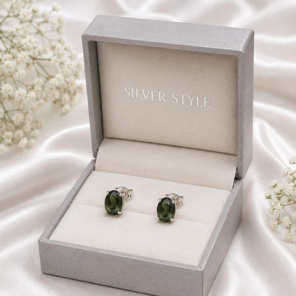 Oval green Green Tourmaline ear studs in 925 Sterling Silver with four-prong setting